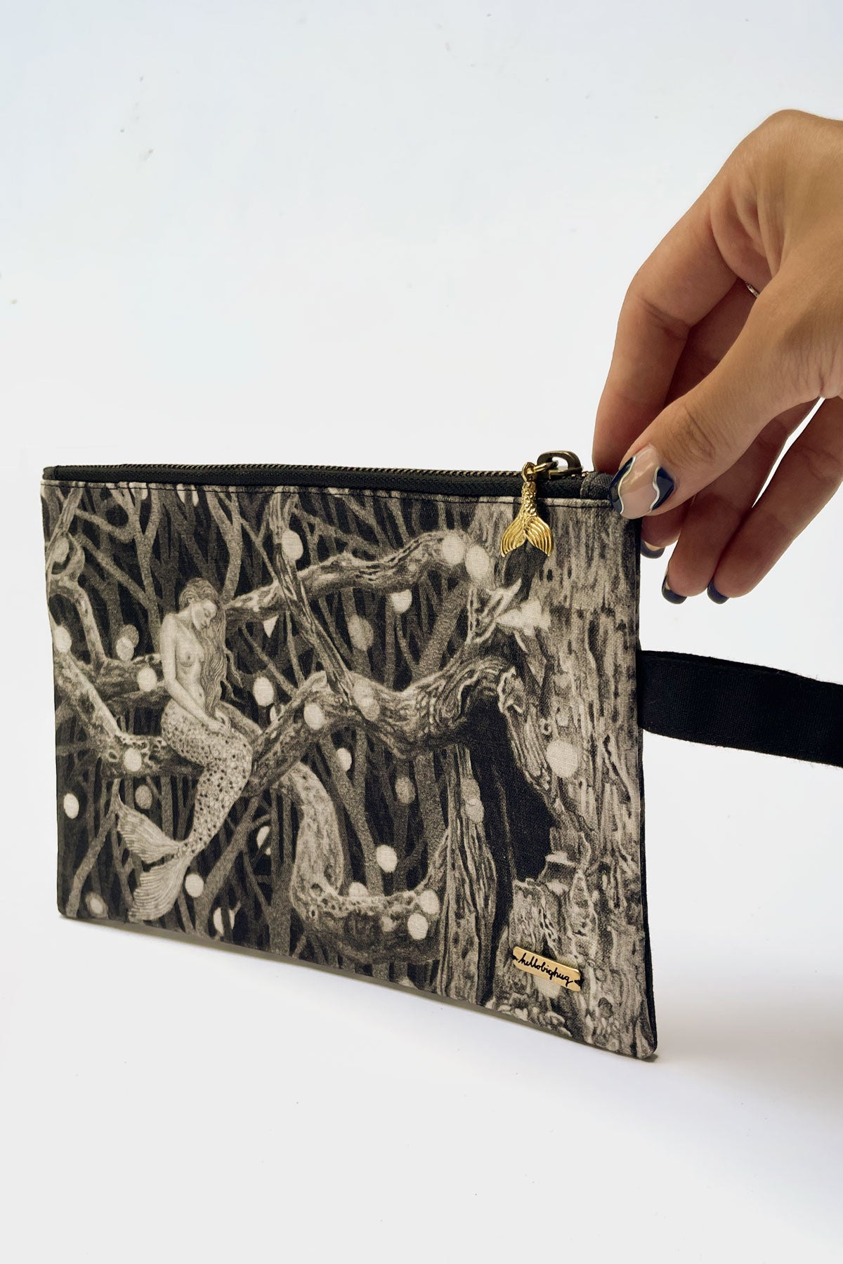 Details of Mermaid Pouch of Hello Big Hug. Features the Illustration "after the storm" by Tattoo Artist Suflanda